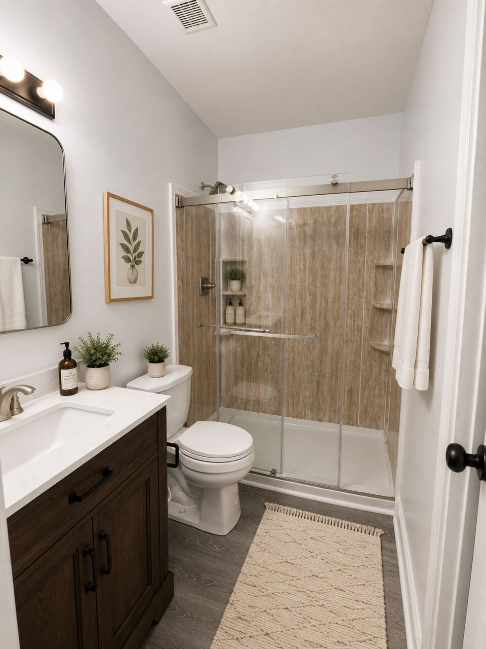 A private en suite bathroom with a walk-in shower and vanity