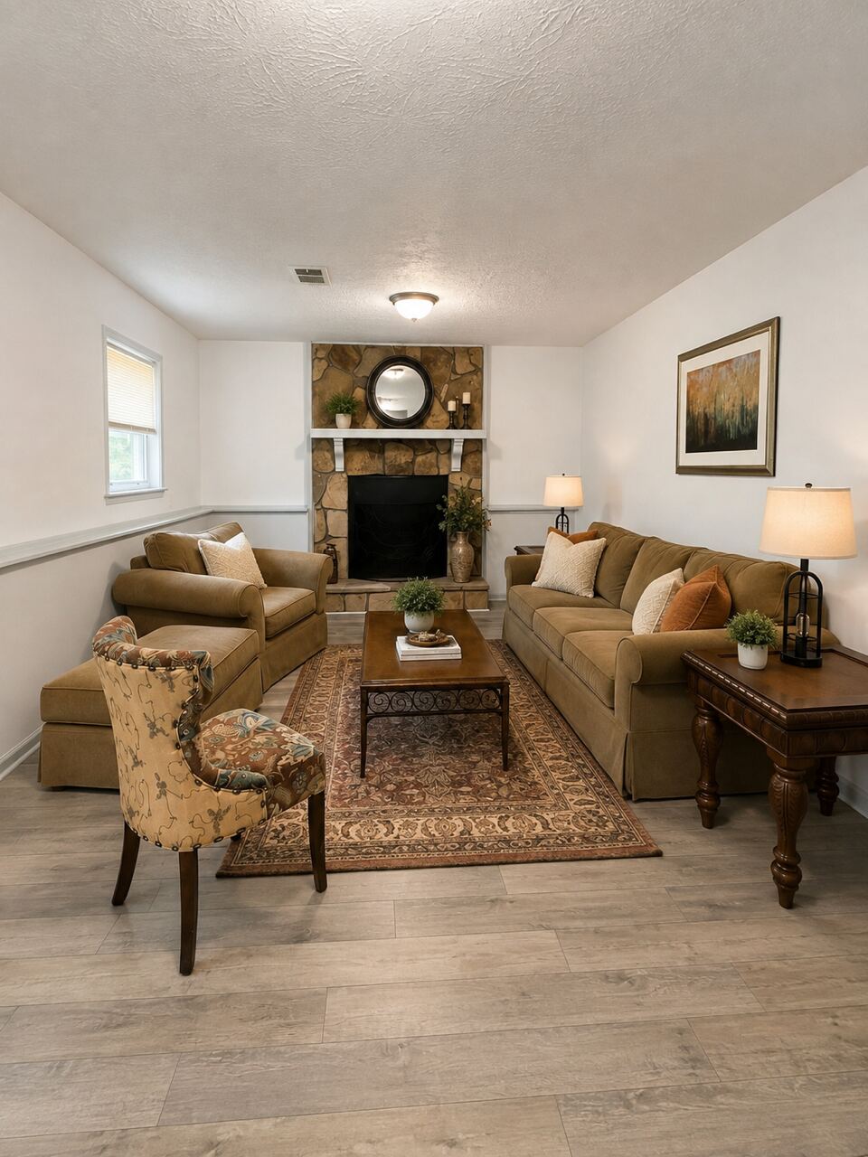 The shared living room with a fireplace and seating